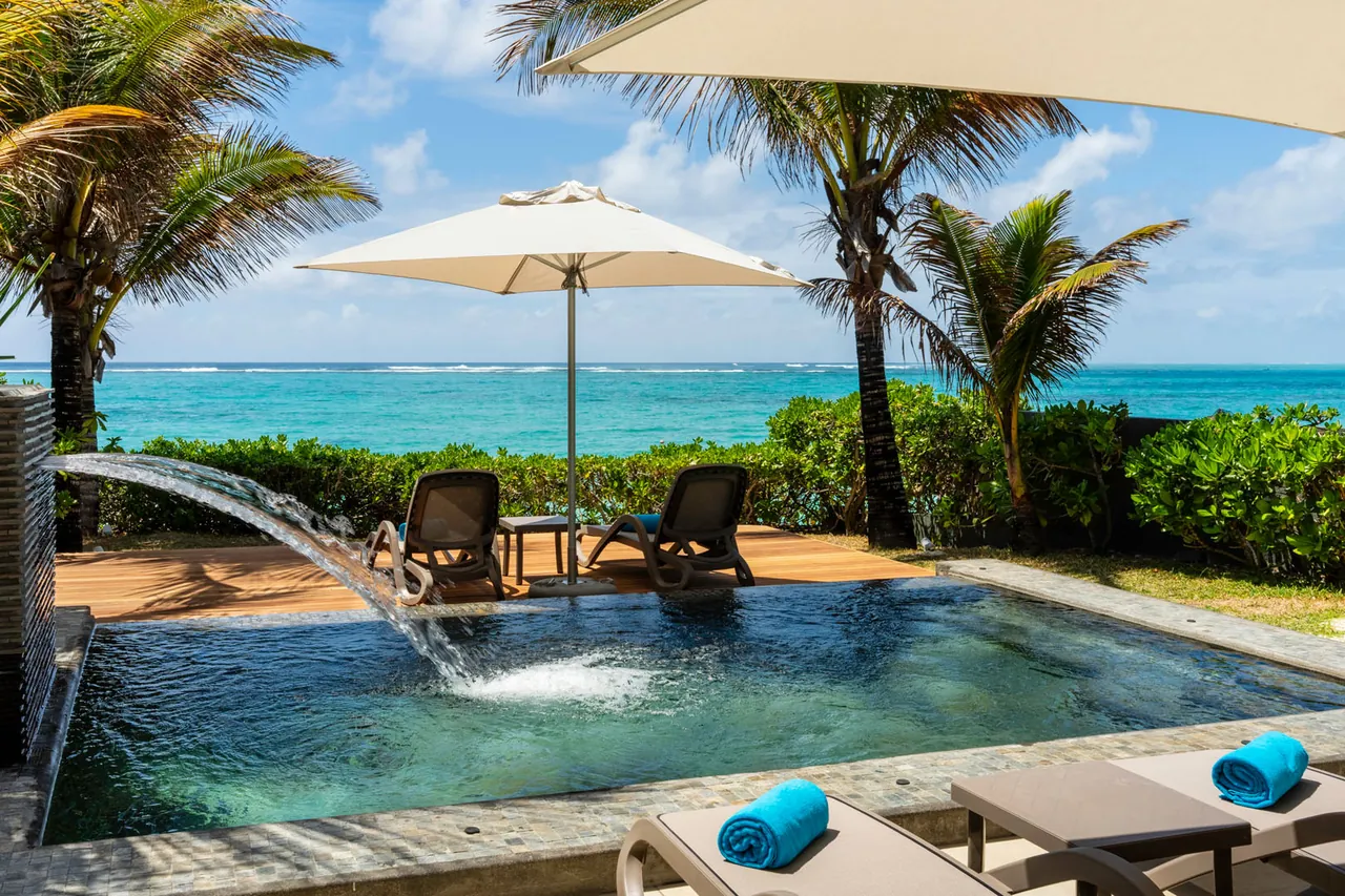 Private pool and deck at the beachfront villa